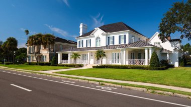 Tampa, Florida USA - September 27, 2019: Luxury estate homes on Bayshore Boulevard along Hillsborough Bay. clipart