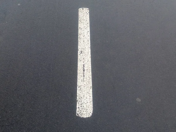 single lane markings in the city on asphalt