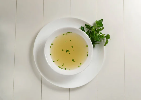 Fresh Bouillon White Plate Finely Chopped Herbs White Background Hot — Stock Photo, Image