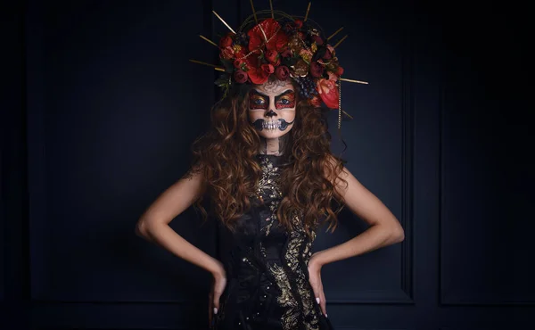 Portrait of a young beauty woman with sugar skull makeup