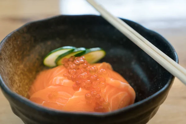 Salmon Ikura Don - Japanese cuisine, Salmon and Roe Rice Bowl in table at  Japanese food restaurant