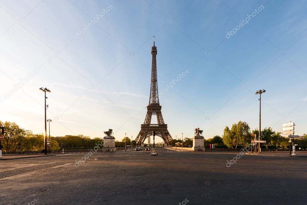 Eiffel Tower and river Seine at sunrise in Paris, France. Eiffel Tower is one of the most iconic landmarks of Paris.