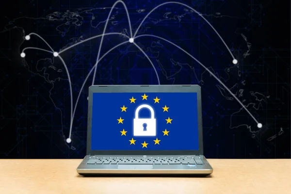 General Data Protection Regulation - laptop on a table, blue screen with GDPR