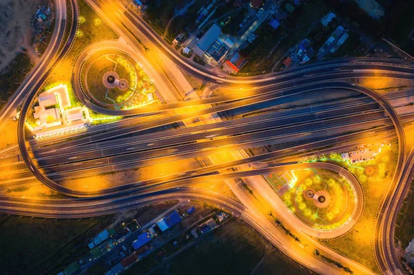 Aerial view of highway junctions Top view of Urban city, Bangkok