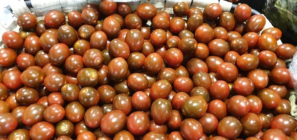 Delicious red tomatoes. Agricultural cultivation in the San Sebastian market. Can be used as a background.