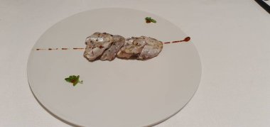 Geleneksel usulde rosto hake. Bask ülkesindeki Donostia San Sebastian 'da bir restoranda.