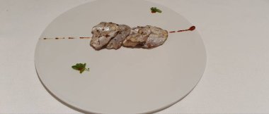 Geleneksel usulde rosto hake. Bask ülkesindeki Donostia San Sebastian 'da bir restoranda.