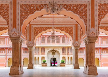 Jaipur city palace in Jaipur city, Rajasthan, India. An UNESCO world heritage know as beautiful pink color architectural elements. A famous destination in India. clipart