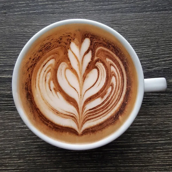 Vista Superior Una Taza Café Latte Arte Sobre Fondo Madera —  Fotos de Stock