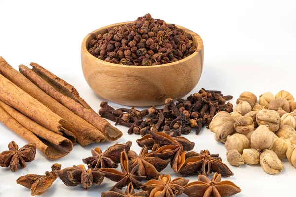 Assorted colorful spices on a white background. Healthy diet lifestyle.