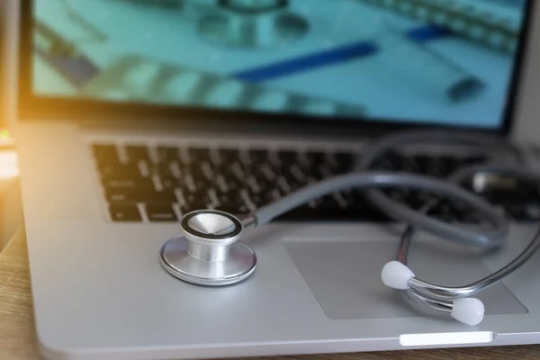 stethoscope on laptop Doctor working in hospital Healthcare and medical concept test