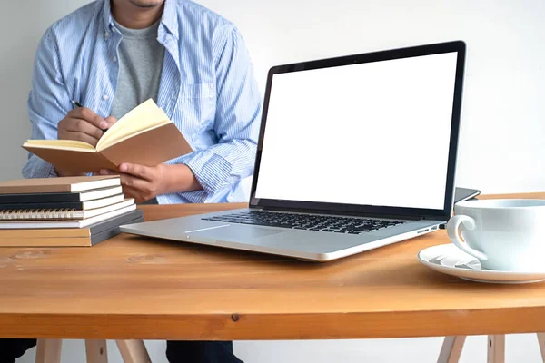 Laptop with blank screen on table. Workspace background new project on laptop computer with blank copy space screen for your advertising text message