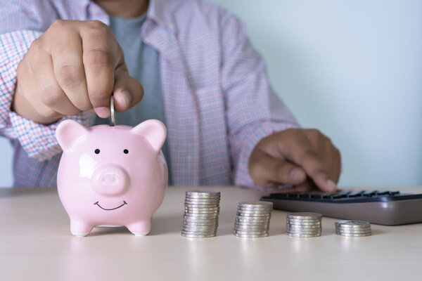 man Savings Coins wealth and financial Saving money business concept