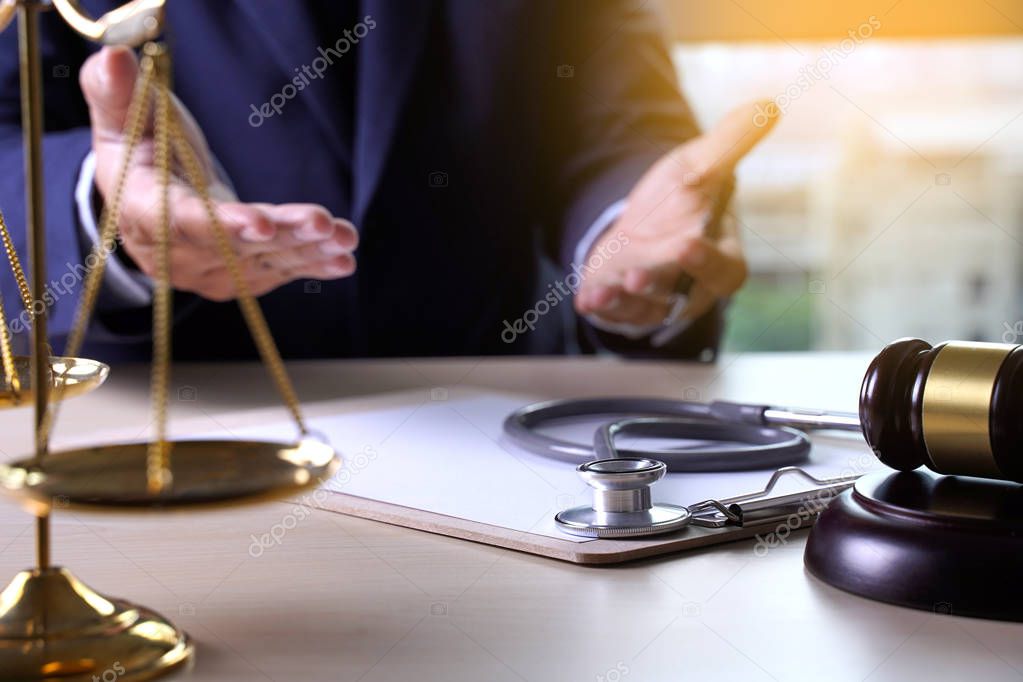 Law gavel stethoscope Health care business rules