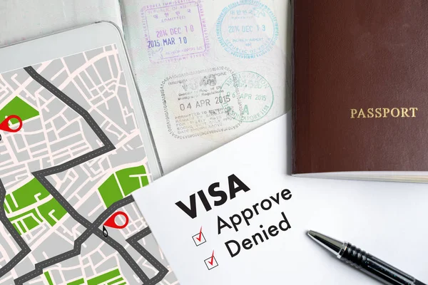 Visa and passport to approved stamped on a document top view in Immigration Visa approve