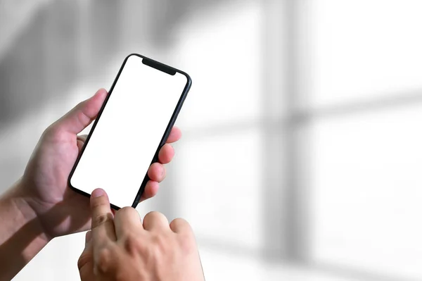 Mockup hands holding mobile phone with blank screen — Stock Photo, Image