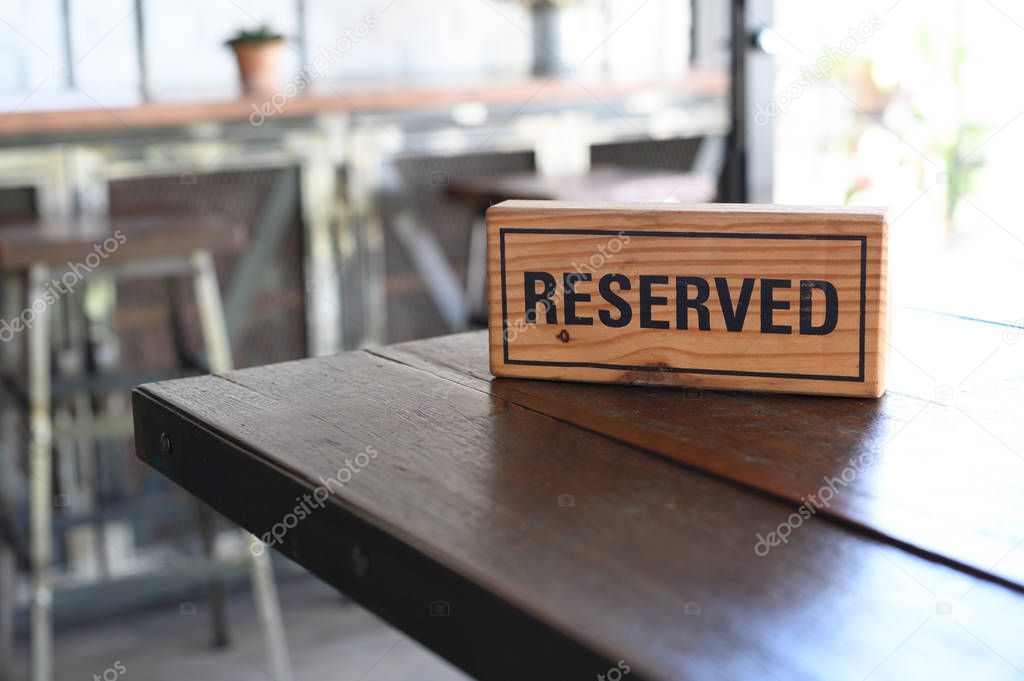 Restaurant reserved table sign Reserved Table. A tag of reservat