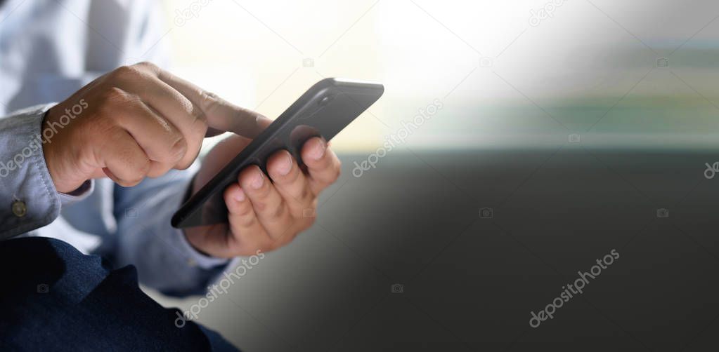 man holding en hands and using digital tablet  Mobile Phone tele