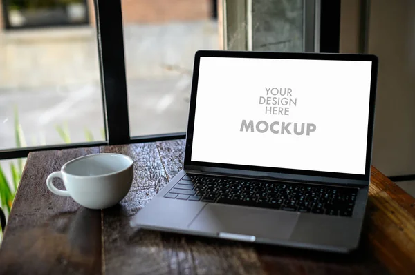 Mockup of business man using laptop screen for your advertising