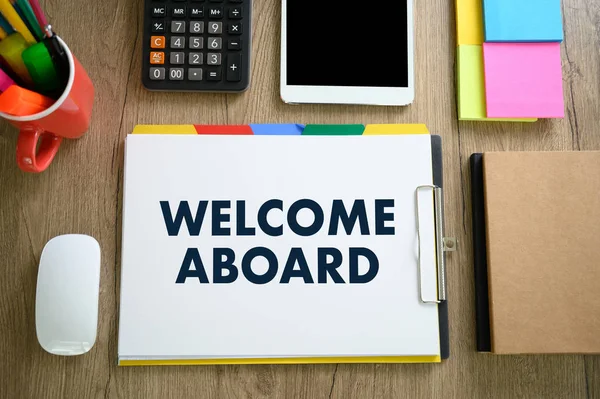 WELCOME ABOARD Business team hands at work with financial report — Stock Photo, Image