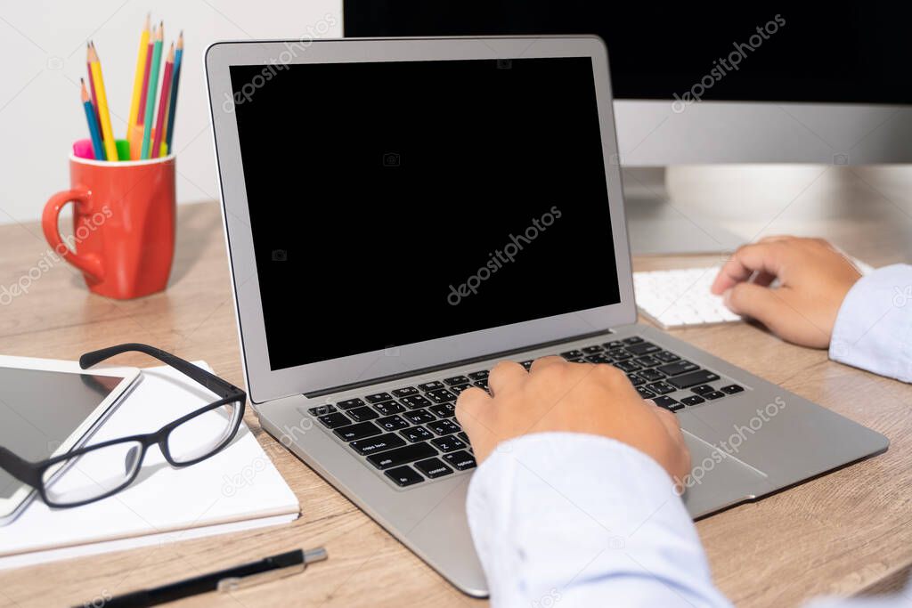 Laptop with blank screen on table. Workspace background new project on laptop computer with blank copy space screen for your advertising text message