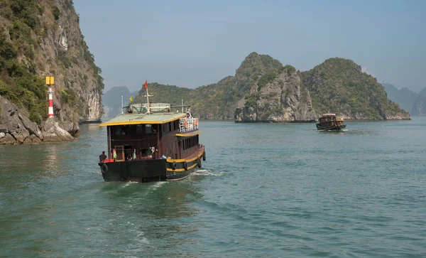 stock image Lan Ha Bay, Cat Ba Island, Vietnam - FEB 26, 2020: Tourist vessels and boats floating on the Lan Ha Bay in Vietnam