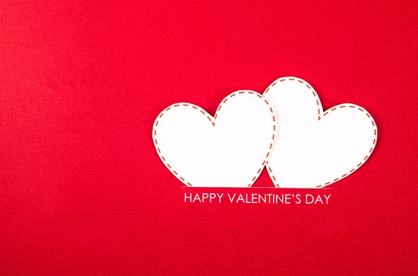 Днем Святого Валентина Білим Серцем Червоному Тлі — стокове фото