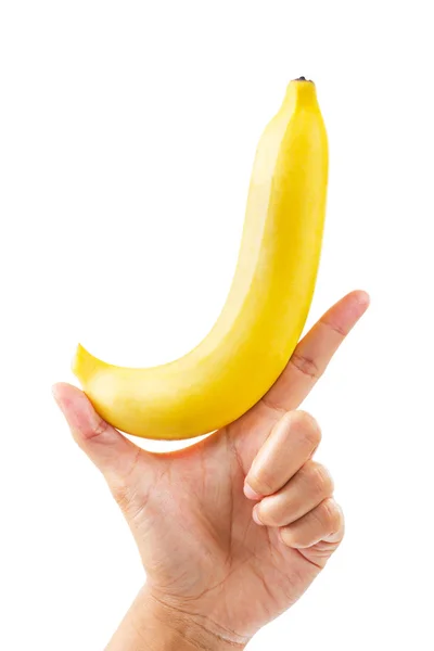 Hand holding ripe banana fruit isolated on white background. — Stock Photo, Image