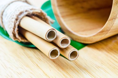 Ecological bamboo straws tube for drinking water. clipart