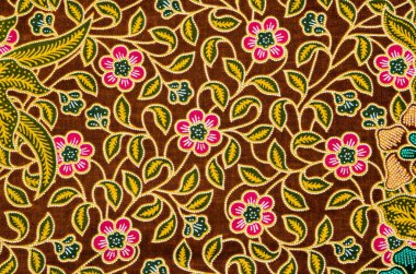 Geleneksel kıyafet haline gelen Batik tekstil deseni sanatın güzelliği..