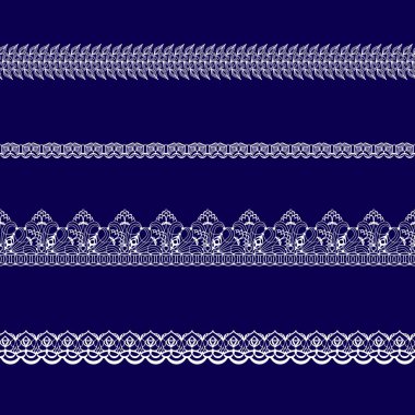 mavi bir arka plan üzerinde beyaz dantel kurdeleler kümesi