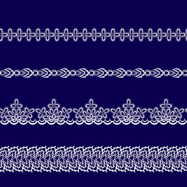 mavi bir arka plan üzerinde beyaz dantel kurdeleler kümesi