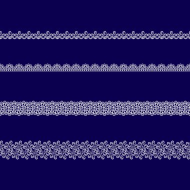 mavi bir arka plan üzerinde beyaz dantel kurdeleler kümesi