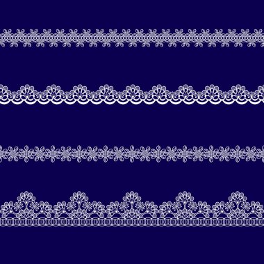 mavi bir arka plan üzerinde beyaz dantel kurdeleler kümesi