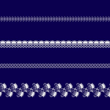 mavi bir arka plan üzerinde beyaz dantel kurdeleler kümesi