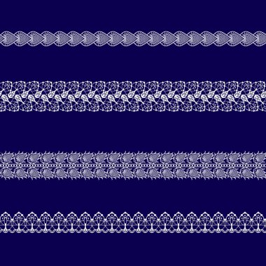 mavi bir arka plan üzerinde beyaz dantel kurdeleler kümesi