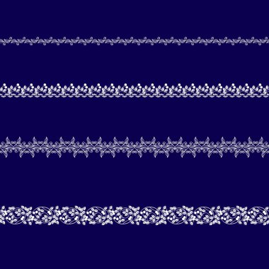 Beyaz dantel kurdeleler kümesi