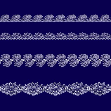 Beyaz dantel kurdeleler kümesi