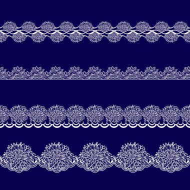 Beyaz dantel kurdeleler kümesi