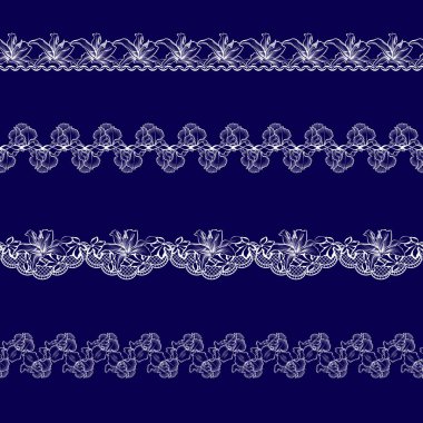 Beyaz dantel kurdeleler kümesi