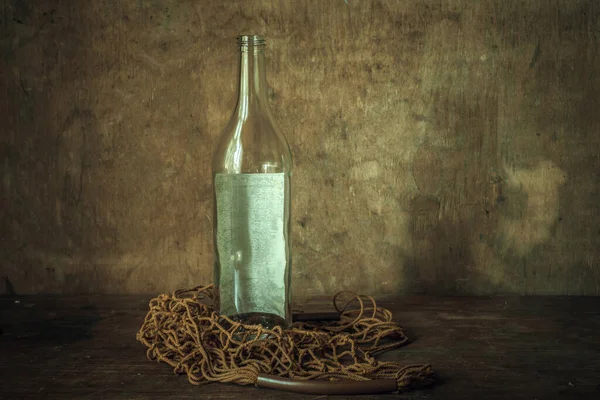 Glass Bottle Russian Vodka Bag Net Wooden Table — Stock Photo, Image