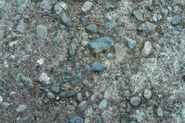 Yerde Kumla Yuvarlak Granit Taşlar Var — Stok fotoğraf