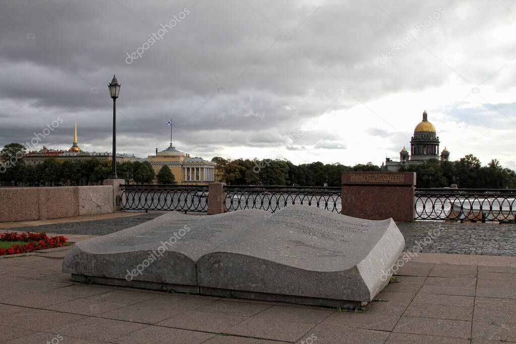 Granite book in Saint Petersburg, St. Isaac's Cathedral and the Admiralty building in the background