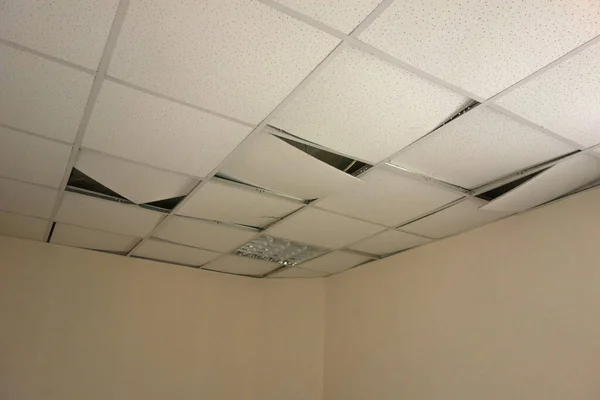 Broken ceiling in the office after the earthquake