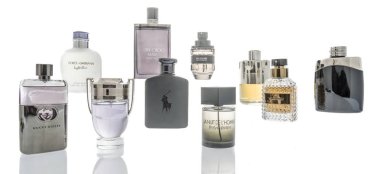 Winneconne, WI -  19 April 2018: A collection of mens luxury cologne including Invictis, Jimmy Choo Man, Gucci Guilty, Polo and Dolce and Gabbana on an isolated background. clipart
