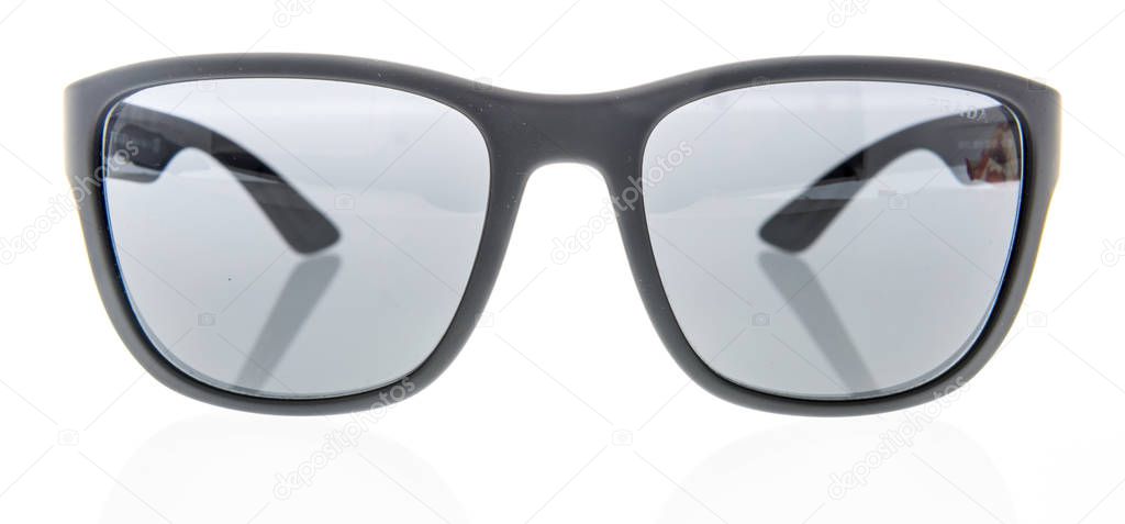 Wnneconne, WI - 4 September 2019:  A pair of Prada luna rossa polarized sunglasses on an isolated background.
