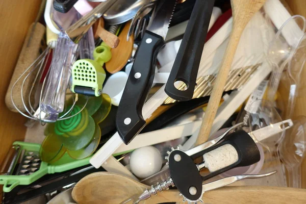 Messy kitchen drawer-untidy kitchen