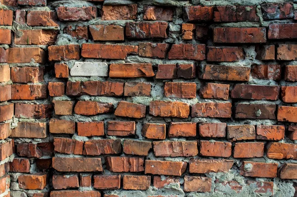 Viejo fragmento de pared de ladrillo rojo — Foto de Stock