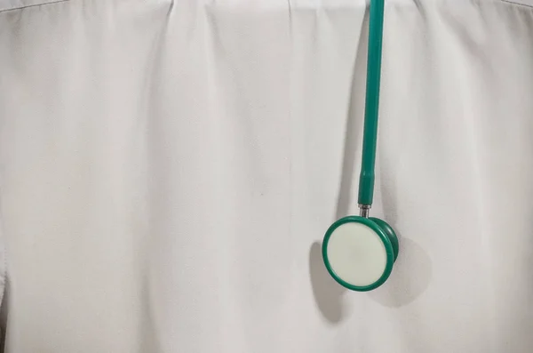 Medical Headphones hang on white shirt