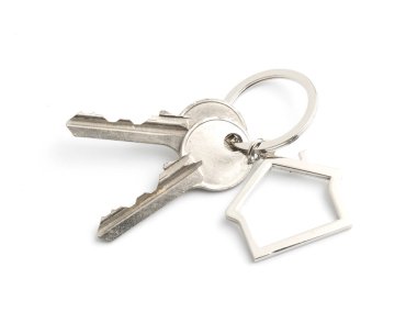 Beyaz arka plan üzerinde izole evin anahtarı